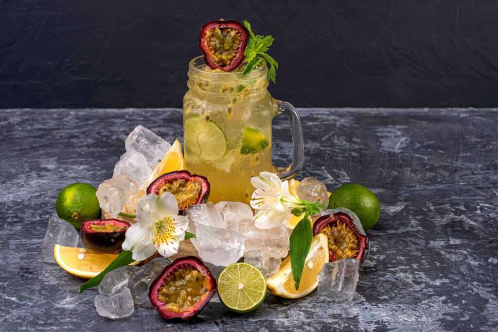 Sliced Lime and Passion Fruit on an Ice Cold Drink